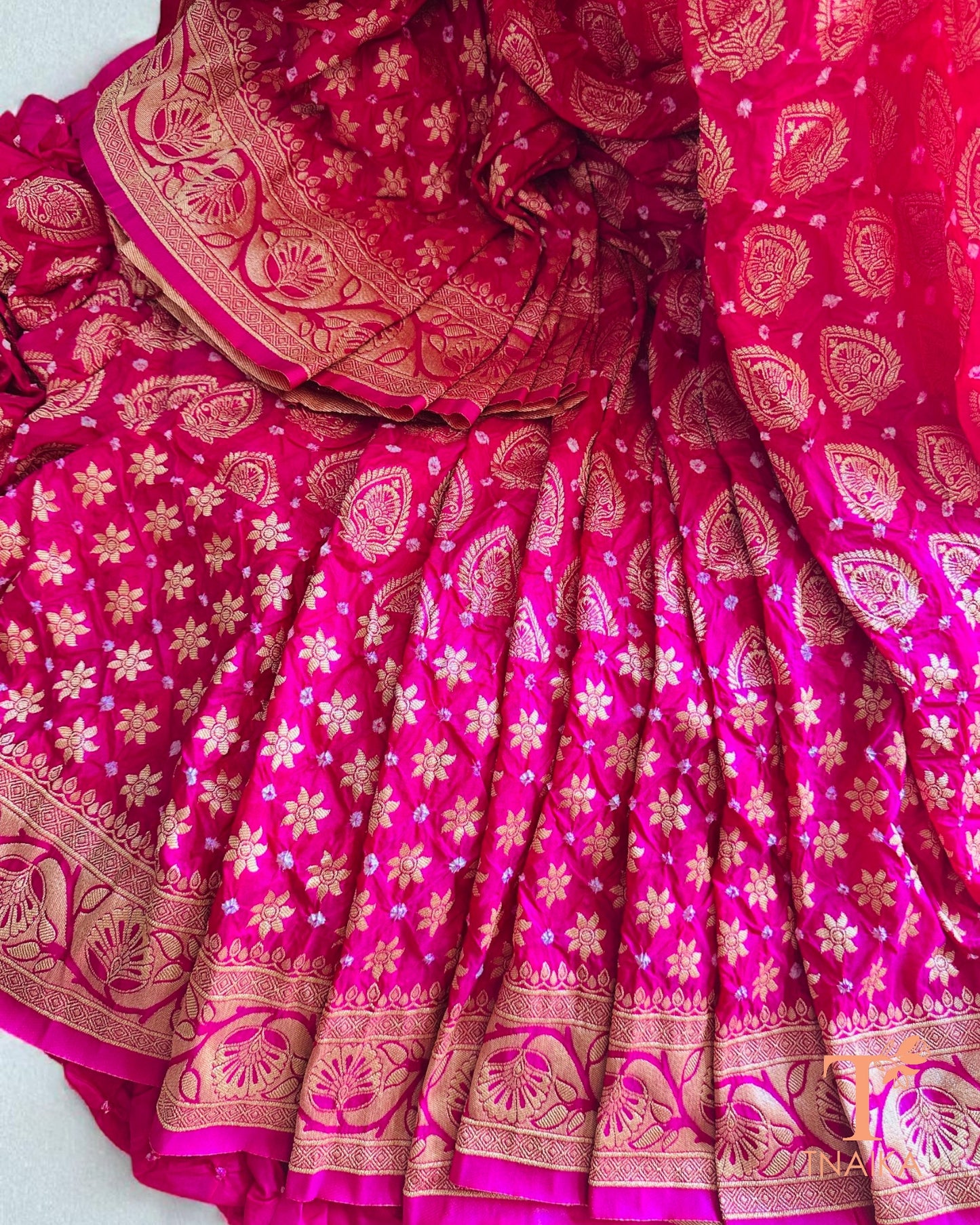 Festive Upada silk saree with Bandhej print and woven zari border.