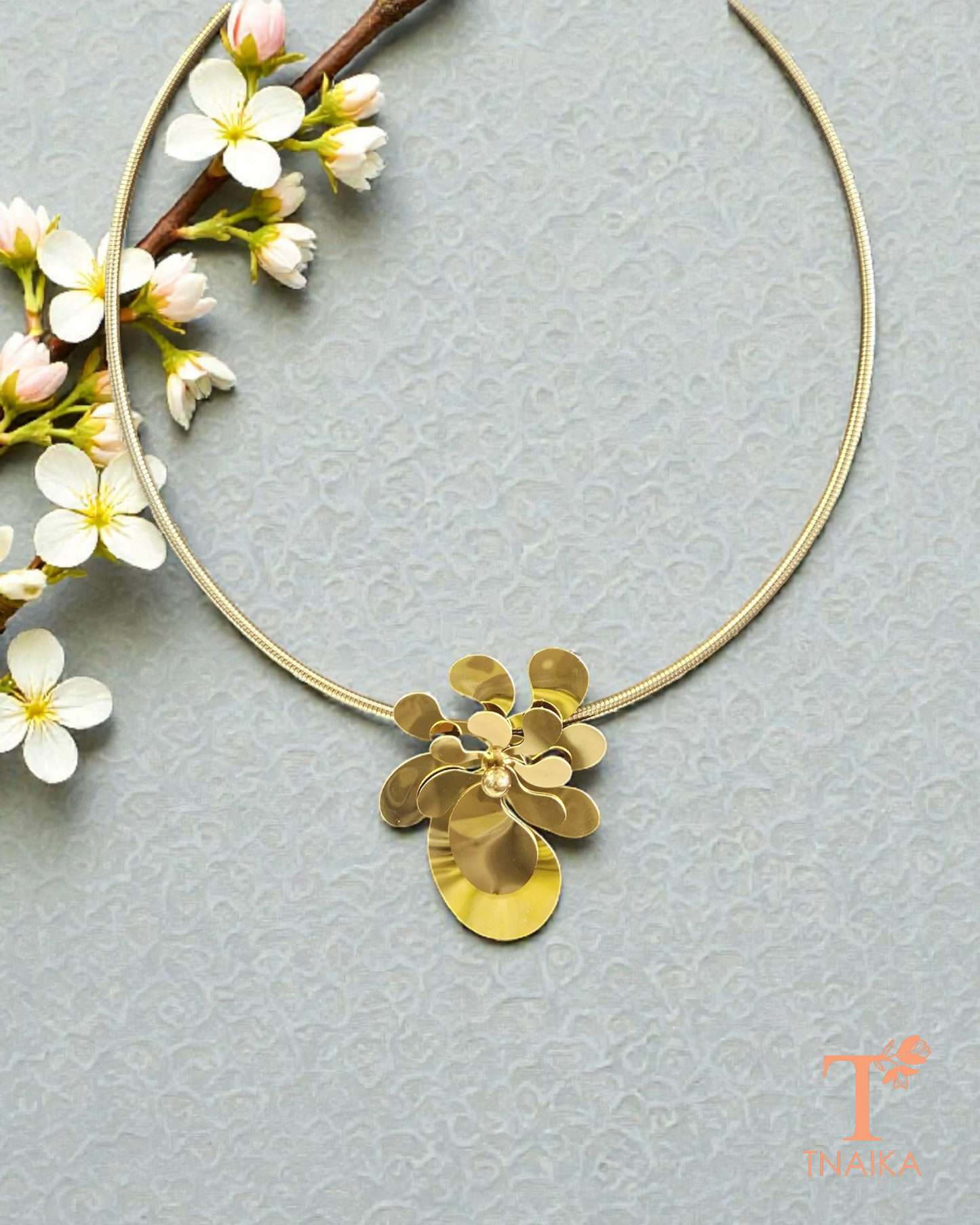 Modern floral gold choker with layered petal design