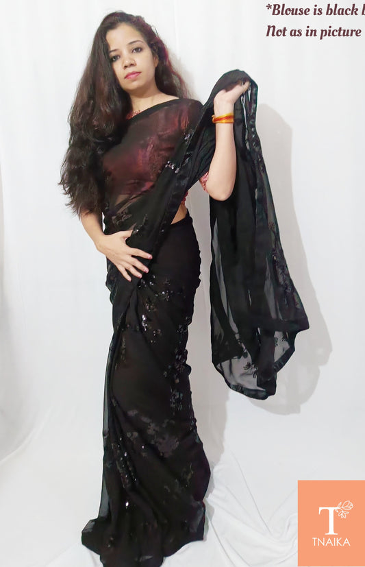 Black sequin saree for party
Black sequin saree for wedding
Black sequin saree for reception
Black cocktail saree
Evening wear black saree
Designer black sequin saree for engagement
Glamorous black saree for events
Festive wear black saree