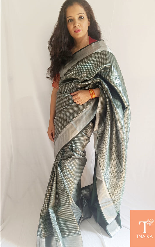 latest saree designs, Indian ethnic wear, saree for special occasions, rich look saree, trendy silk saree, saree shopping online, artificial silk saree, stylish Pattu saree, casual silk saree, best saree for functions, semi silk saree with zari, traditional South Indian saree.