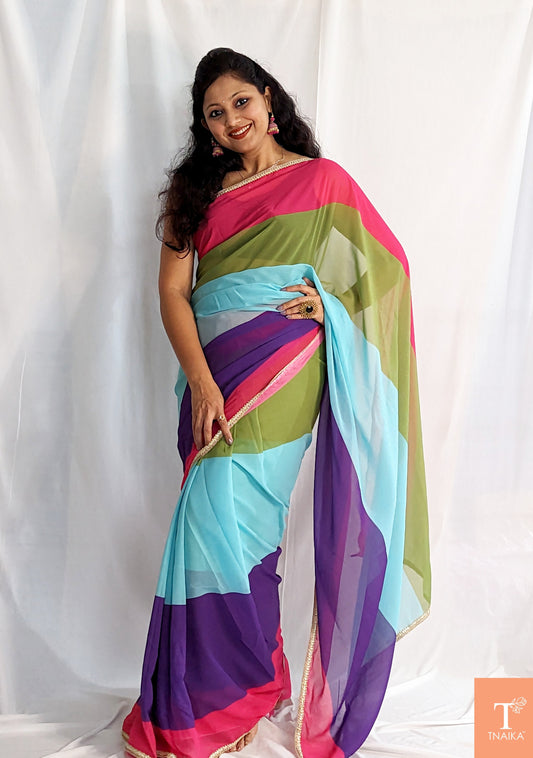 stylish georgette saree, fancy georgette saree, floral georgette saree, abstract print saree, dual-tone saree, pastel georgette saree, bright color saree, Bollywood-style saree, lightweight festive saree, shimmer georgette saree, party look saree, ethnic saree for women, fashionable saree, georgette sari, gradient color saree, bold print saree, modern ethnic saree, breathable fabric saree alia bhatt saree, rocky aur rani saree