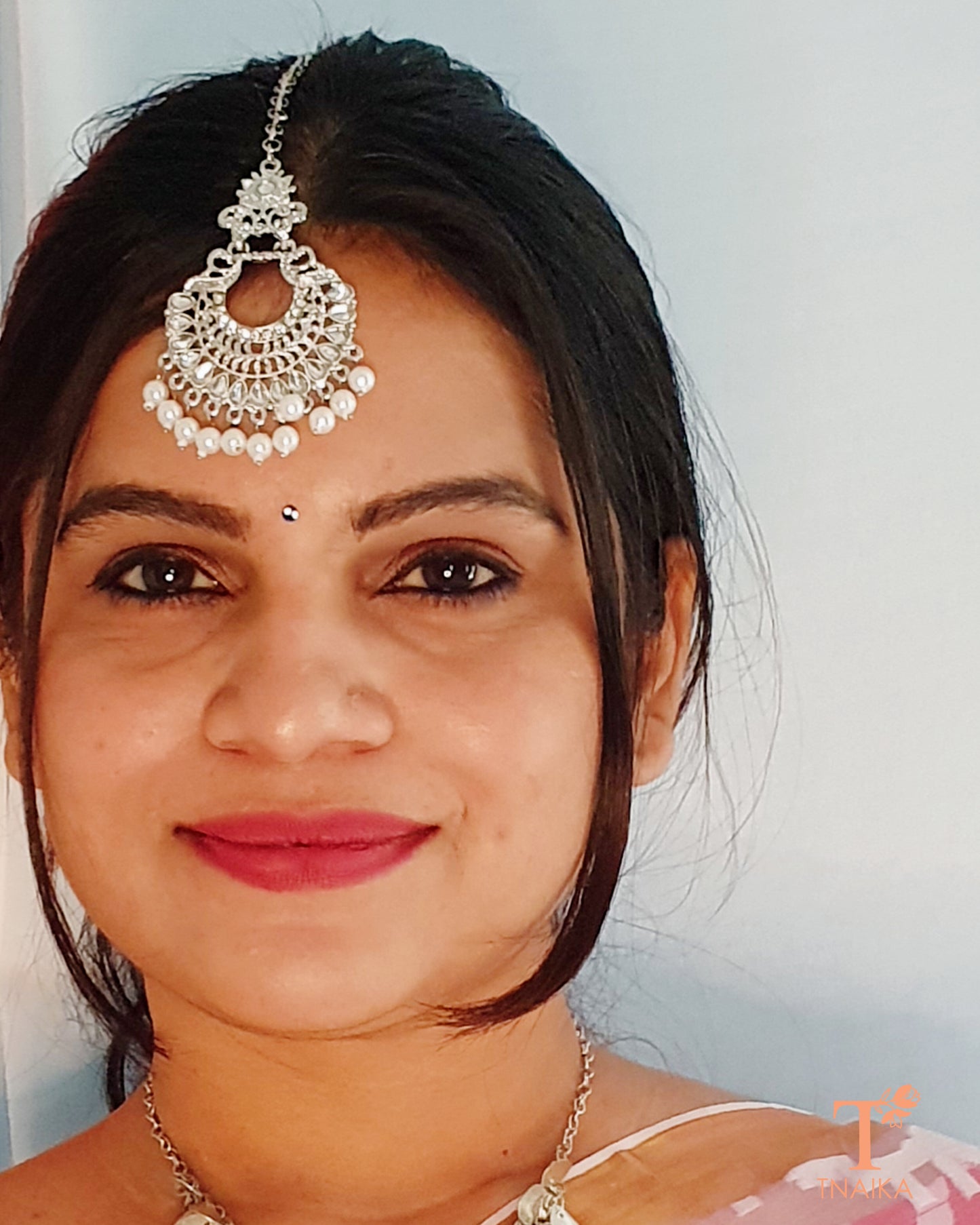 Tnaika silver beaded maangtika
beaded maangtika
stone studded maangtika
silver maangtika
maangtika with beads
maangtika with stones
Indian maangtika
traditional maangtika
bridal maangtika
festive maangtika