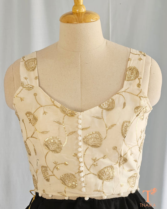 Hand-embroidered golden blouse
Wedding wear blouse designs
Golden zari embroidery blouse
Off-white festive blouse
Blouse with golden floral embroidery
Stylish golden blouse
Off-white blouse for lehenga
Classic golden embroidered blouse
Golden blouse for special occasions
Off-white blouse with intricate embroidery
Golden detailing blouse
Ethnic wear blouse with embroidery