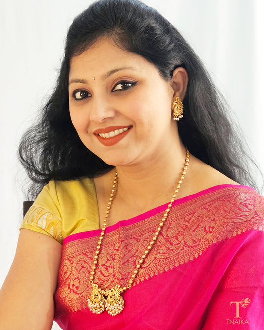 Golden temple necklace set
Antique gold temple jewelry
Temple necklace for women
Gold temple jewelry for weddings
Traditional temple necklace set
Temple jewelry for festive occasions
Bridal temple necklace set
Ethnic temple jewelry set
South Indian temple necklace
Gold temple pendant necklace
Temple necklace with earrings
Gold temple jewelry online
Traditional gold necklace set
Antique temple necklace
Gold temple bridal jewelry