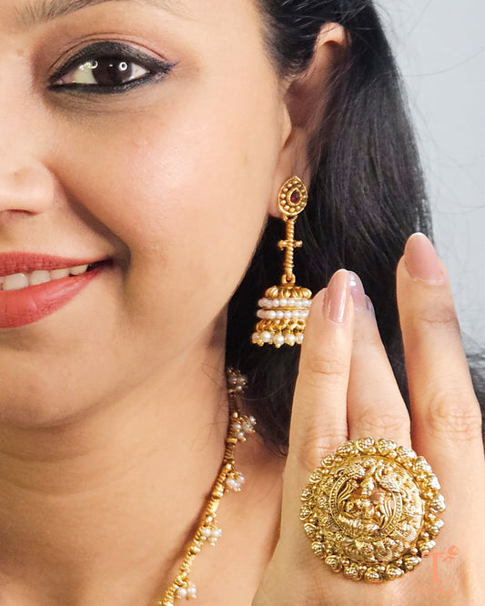 Temple jewelry ring, gold finish temple ring, antique gold ring, traditional temple ring, goddess motif ring, handcrafted temple jewelry, South Indian temple ring, gold-plated ethnic ring