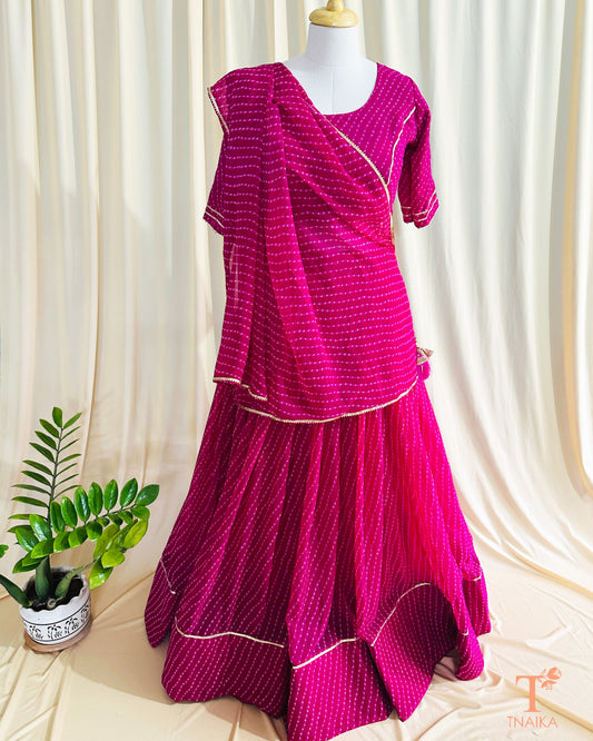 Traditional Leheriya lehenga set in soft georgette fabric with lace accents for an elegant ethnic look