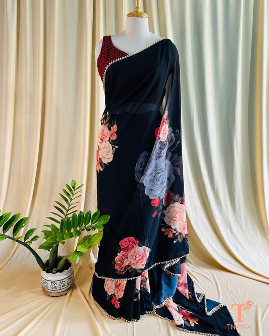 Georgette floral saree with delicate pearl lace border and matching blouse.