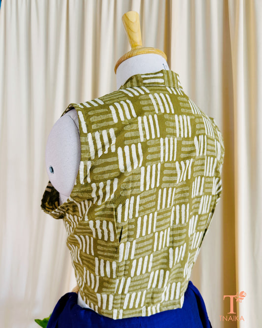 Handcrafted mehendi green blouse featuring soft fabric and stylish finish.