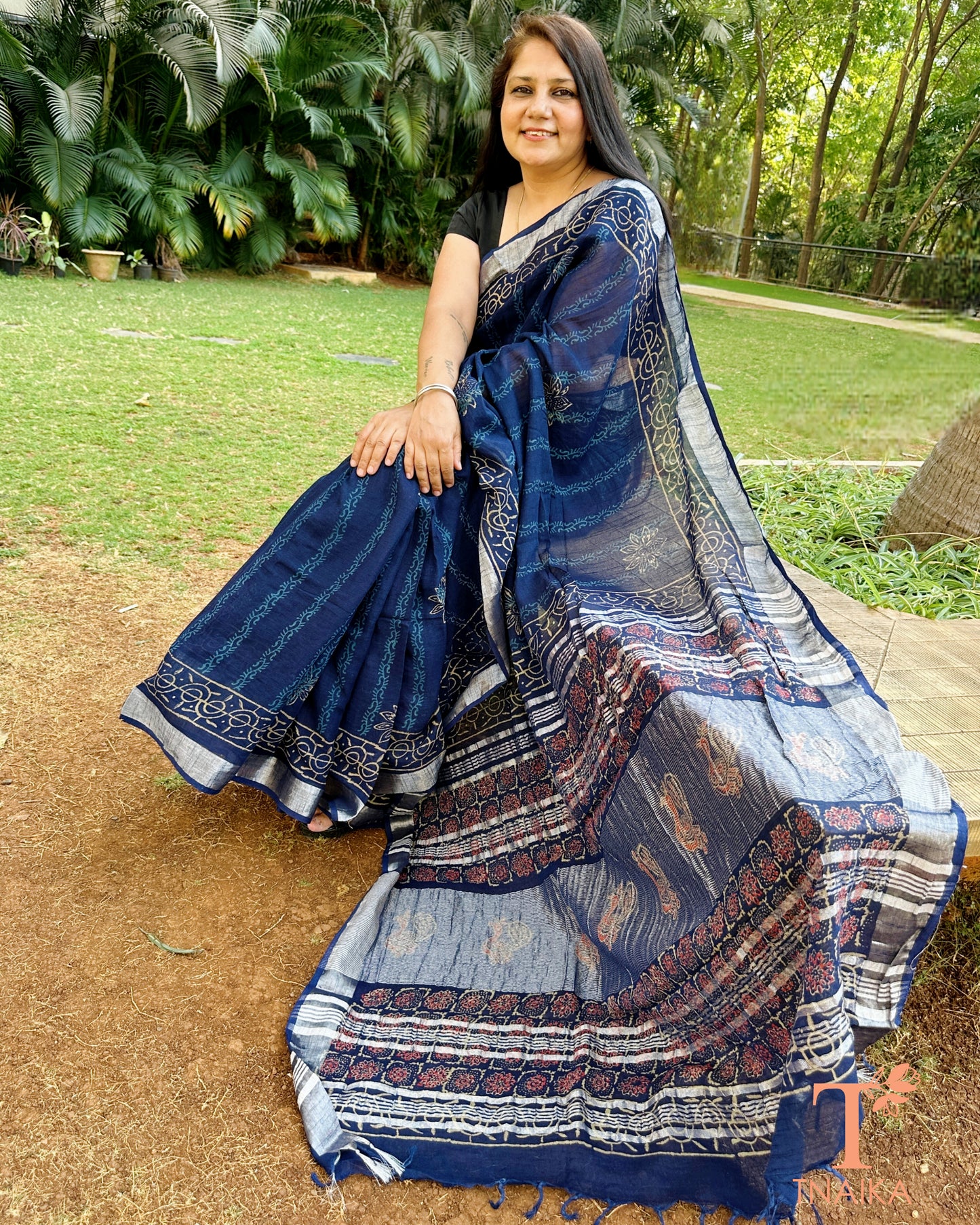 Tnaika navy blue linen saree with handcrafted style pallu design