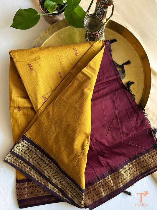 Soft cotton saree featuring traditional woven border and tassels