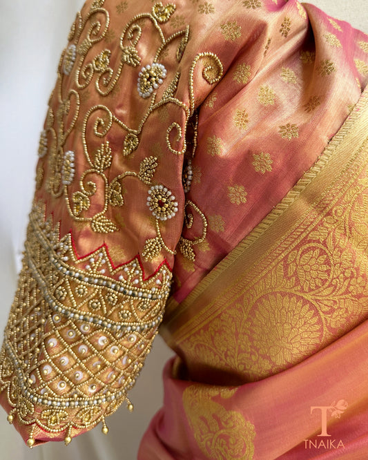 Close-up of heavy aari embroidered blouse with bead detailing