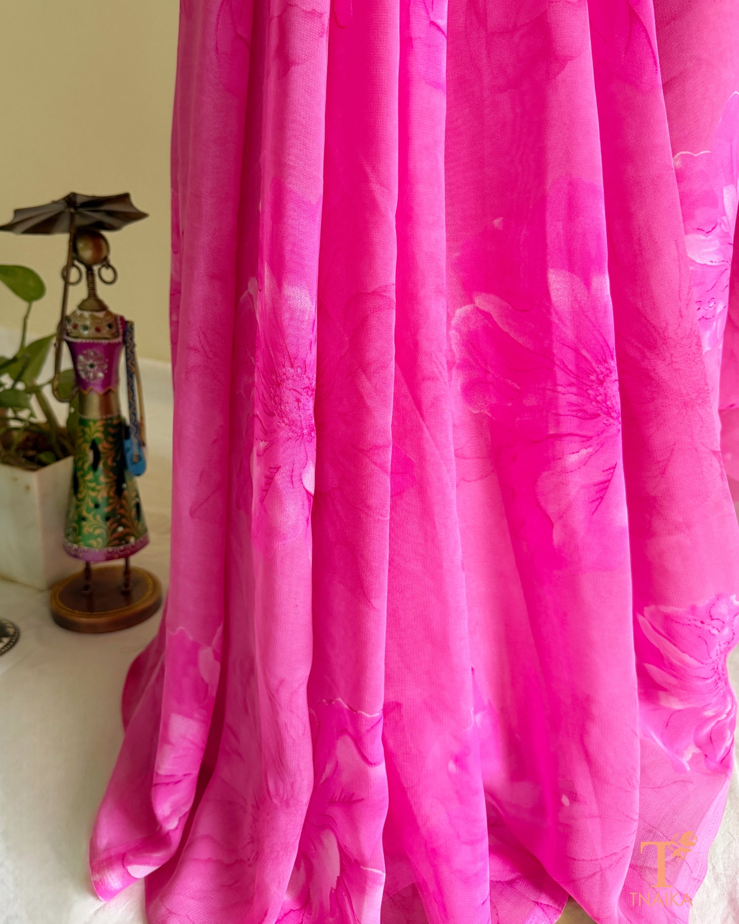 Pink georgette saree with large pink floral prints