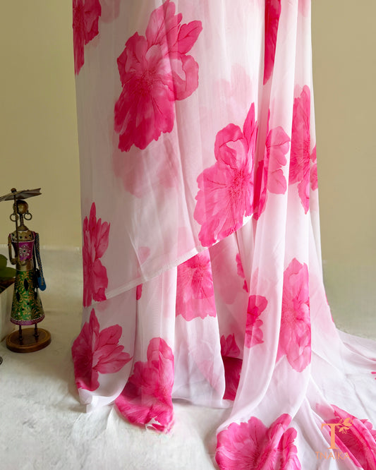 White georgette saree with large pink floral prints