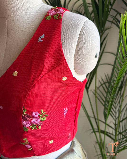 Side view of premium Kota silk saree blouse with intricate floral embroidery and structured silhouette.