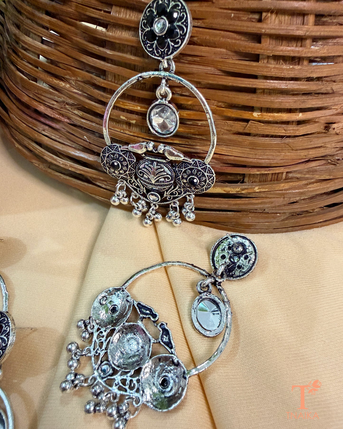 Ethnic oxidised hoop earrings with stone embellishments and vintage-inspired design.