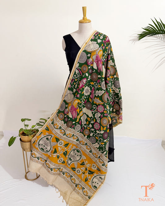 Hand block Kalamkari Nellore silk blend dupatta with fine zari border, traditional artisan prints and soft tassel detailing.