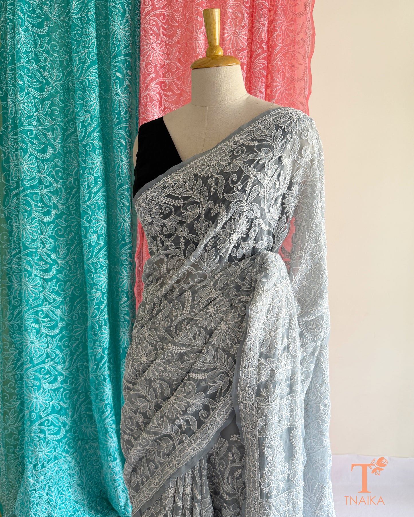 Soft Chikankari embroidered saree with timeless handcrafted detailing.