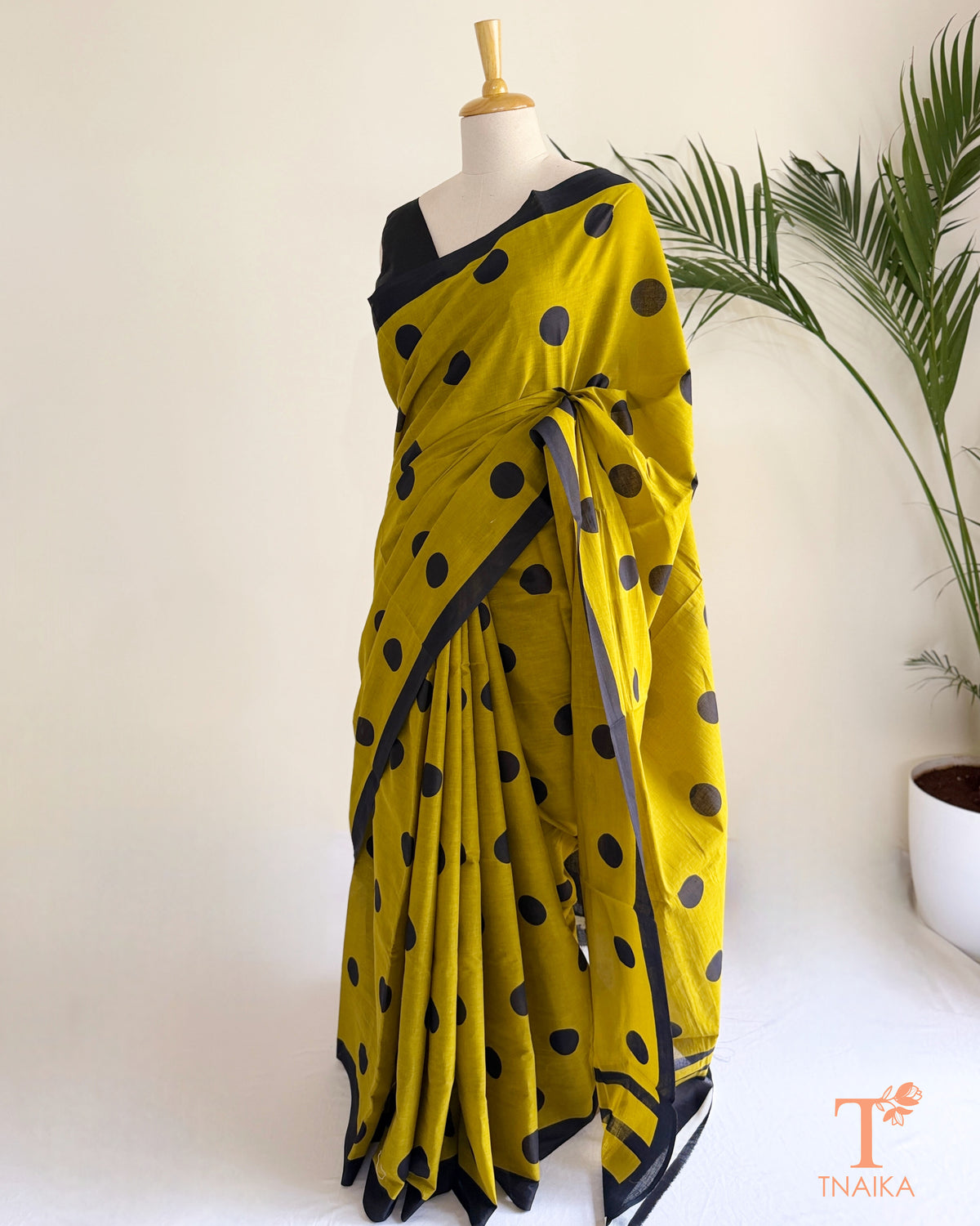 Printed cotton polka dot saree with a soft, lightweight texture and versatile styling