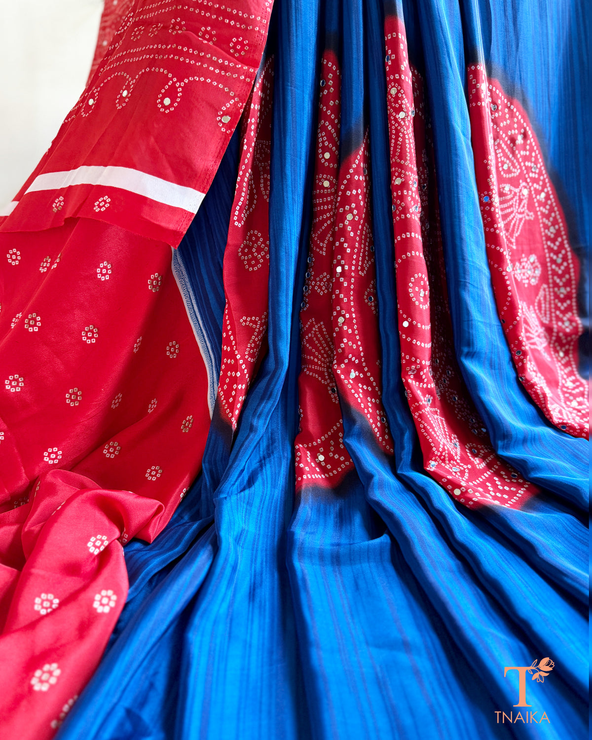 Printed satin silk saree with attached mirror work