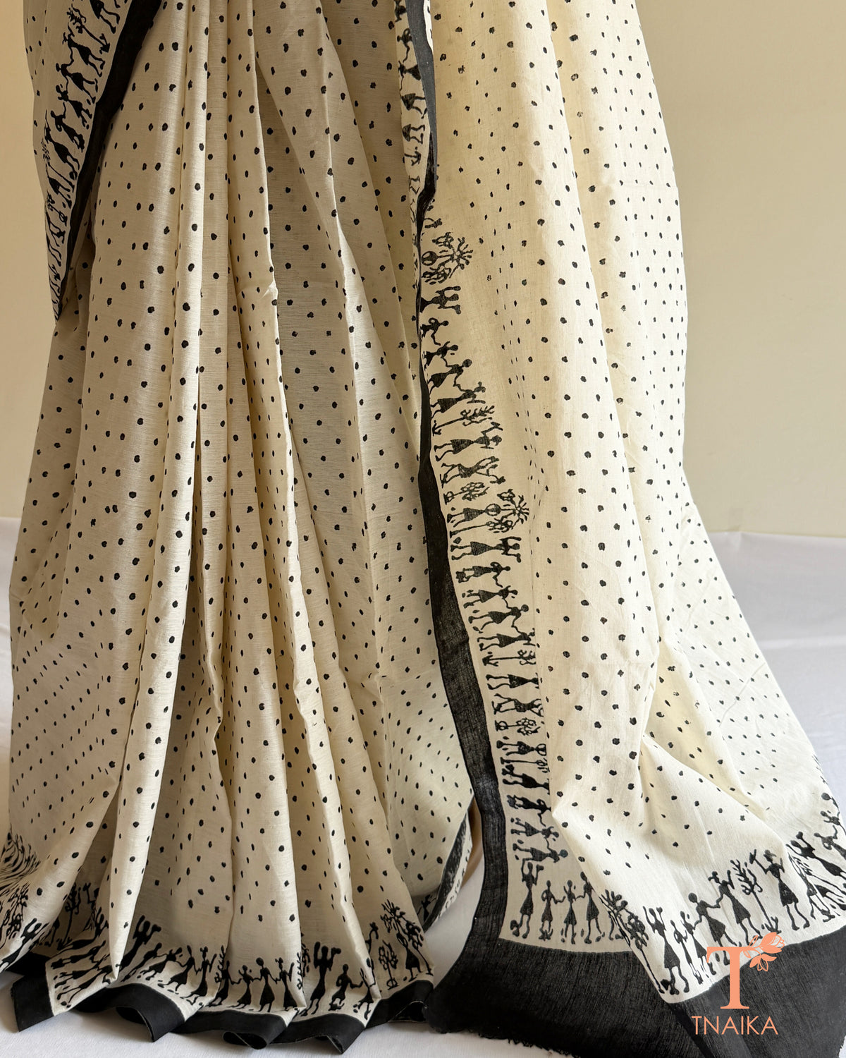Pure cotton saree with traditional Warli-style border and matching blouse fabric