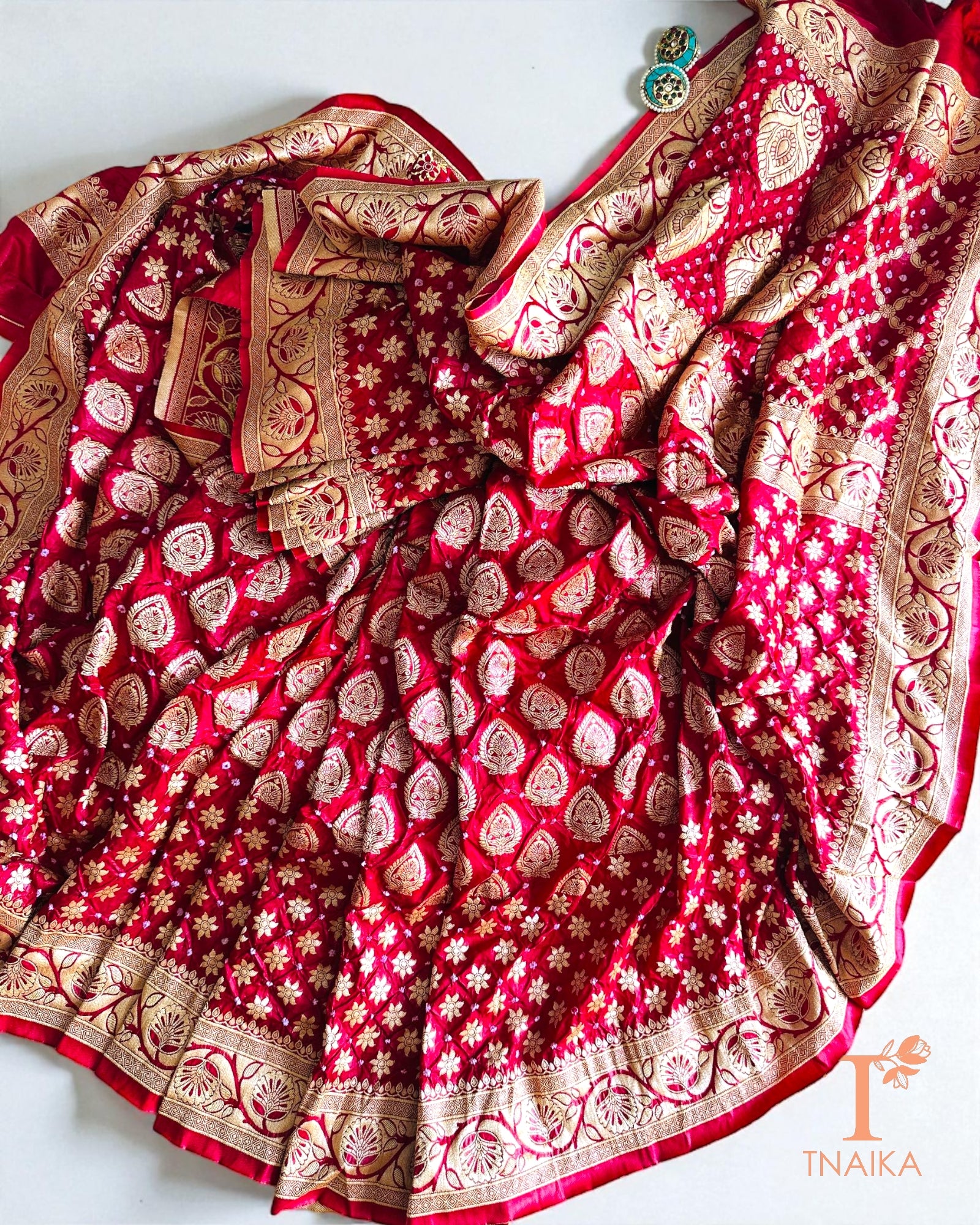 Dupion silk saree featuring Bandhej motifs and zari highlights