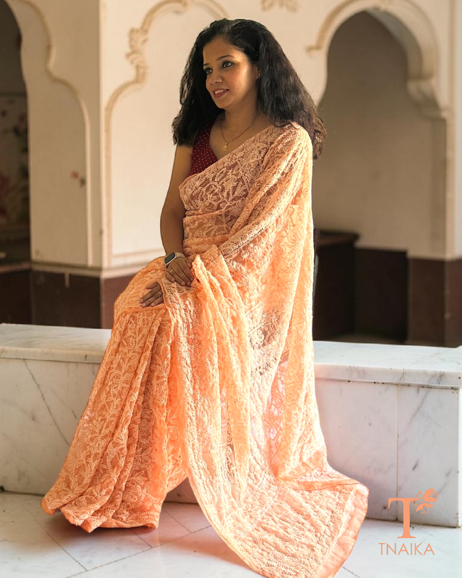 Handcrafted peach chikankari saree in soft georgette with full jaal embroidery