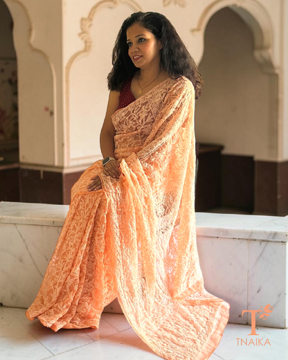 Handcrafted peach chikankari saree in soft georgette with full jaal embroidery