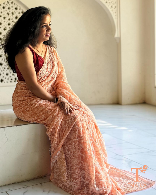 Peach georgette chikankari full jaal saree with handcrafted embroidery
