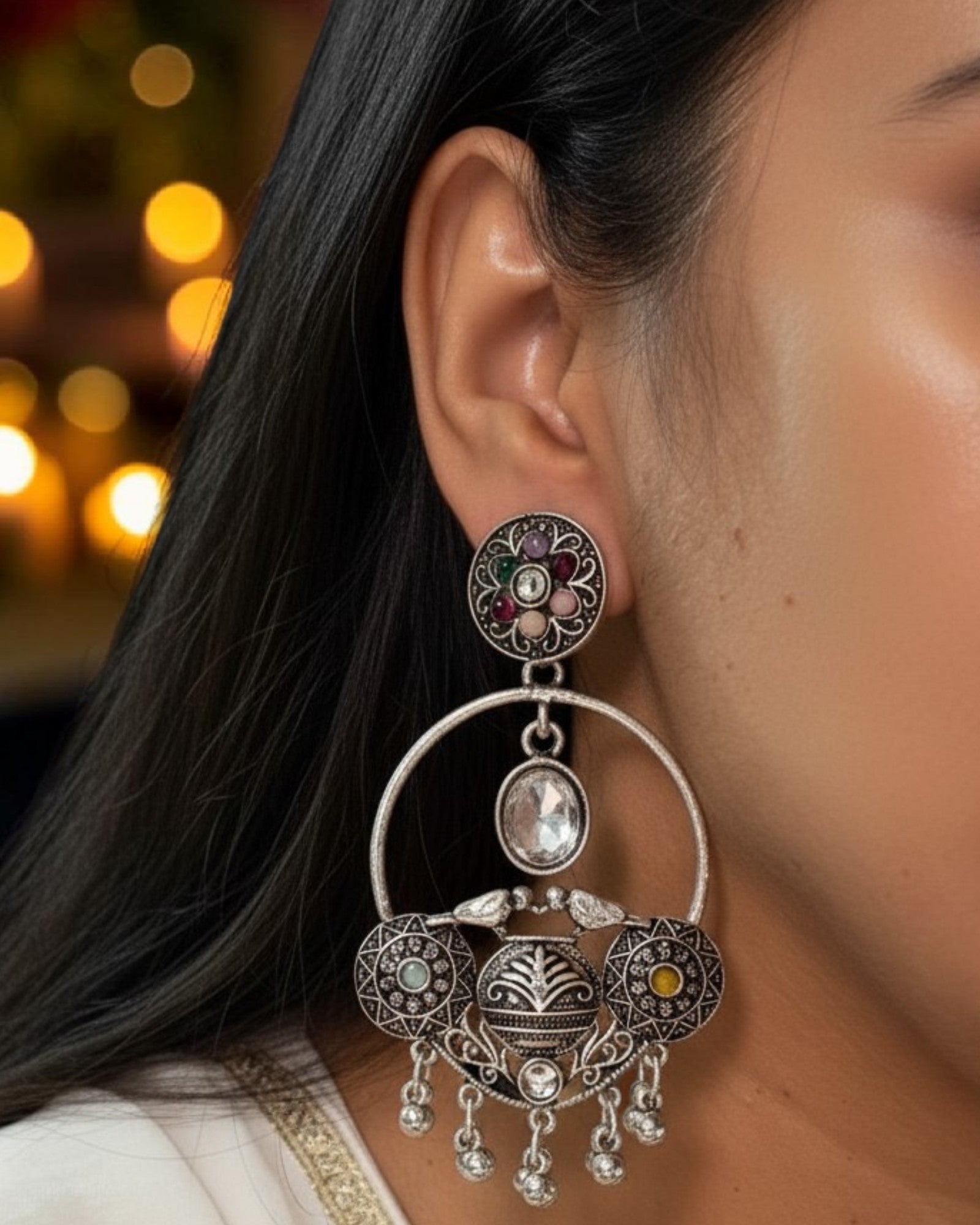 Ethnic oxidised hoop earrings with stone embellishments and vintage-inspired design.