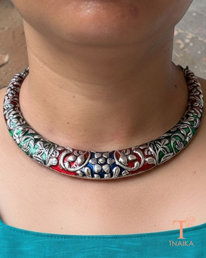 Handcrafted oxidised choker set with colorful enamel detailing and earrings.