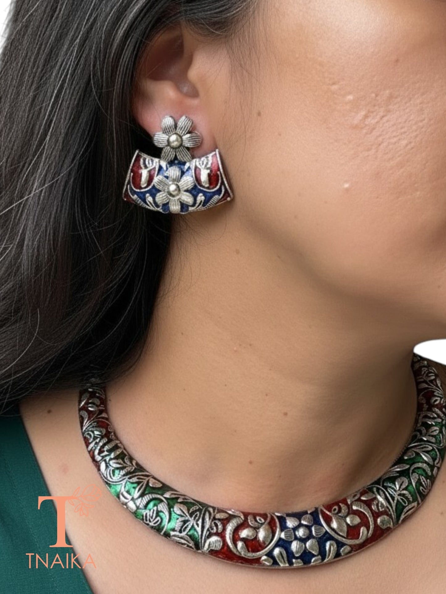 Traditional hasli style choker featuring multicolor meena work and floral motifs.