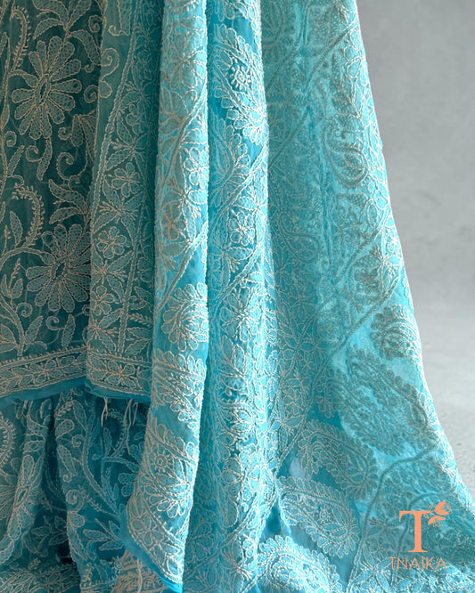 Aqua blue Lucknowi Chikankari saree with intricate white embroidery