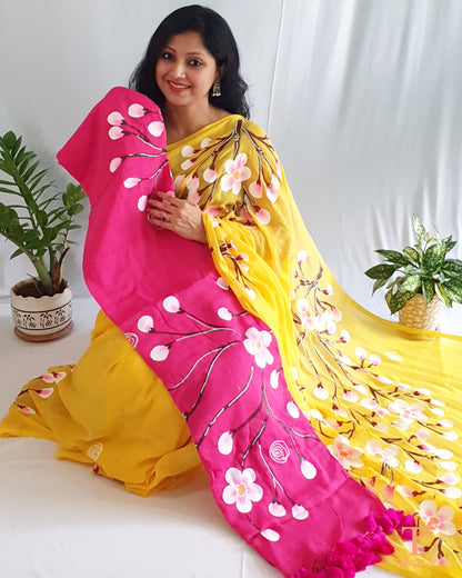 Pink floral saree design Summer cotton saree Casual wear saree Pink saree for women Buy pink cotton hand-painted floral saree online Pink cotton saree with hand-painted flowers for wedding Where to buy a unique hand-painted saree Most comfortable cotton saree for summer Stylish pink floral saree designs