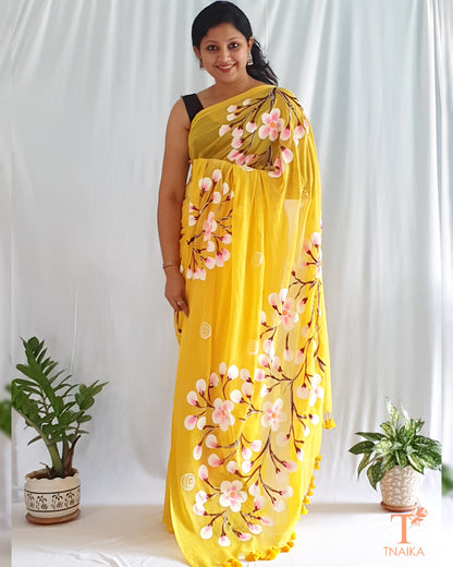  latest collection of yellow sarees with floral prints haldi ceremony yellow saree banarsi yellow saree georgette yellow saree lemon yellow saree zari border yellow saree buy yellow saree online best saree store to buy online best online saree store yellow cotton saree yellow linen saree