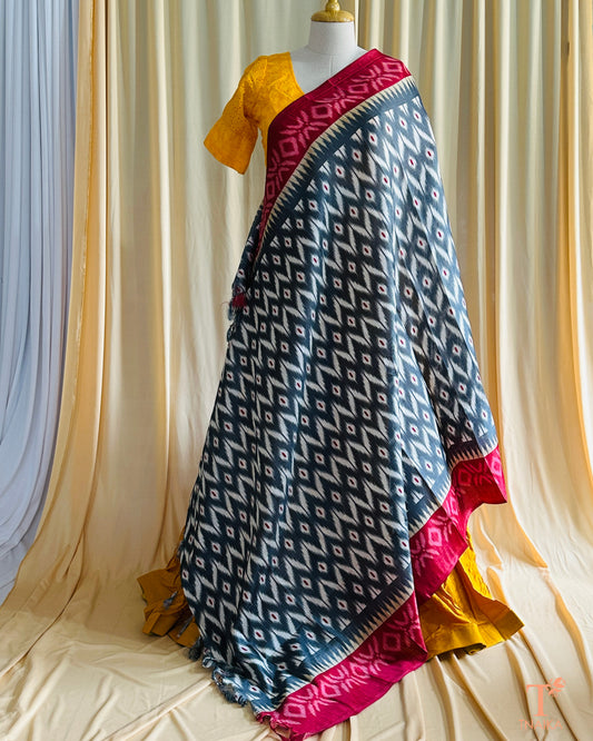 Traditional Ikkat dupatta with bold woven patterns, perfect for layering over kurtas and suits