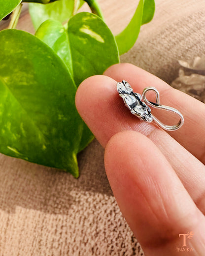 Minimal silver-finish nose pin suitable for everyday use