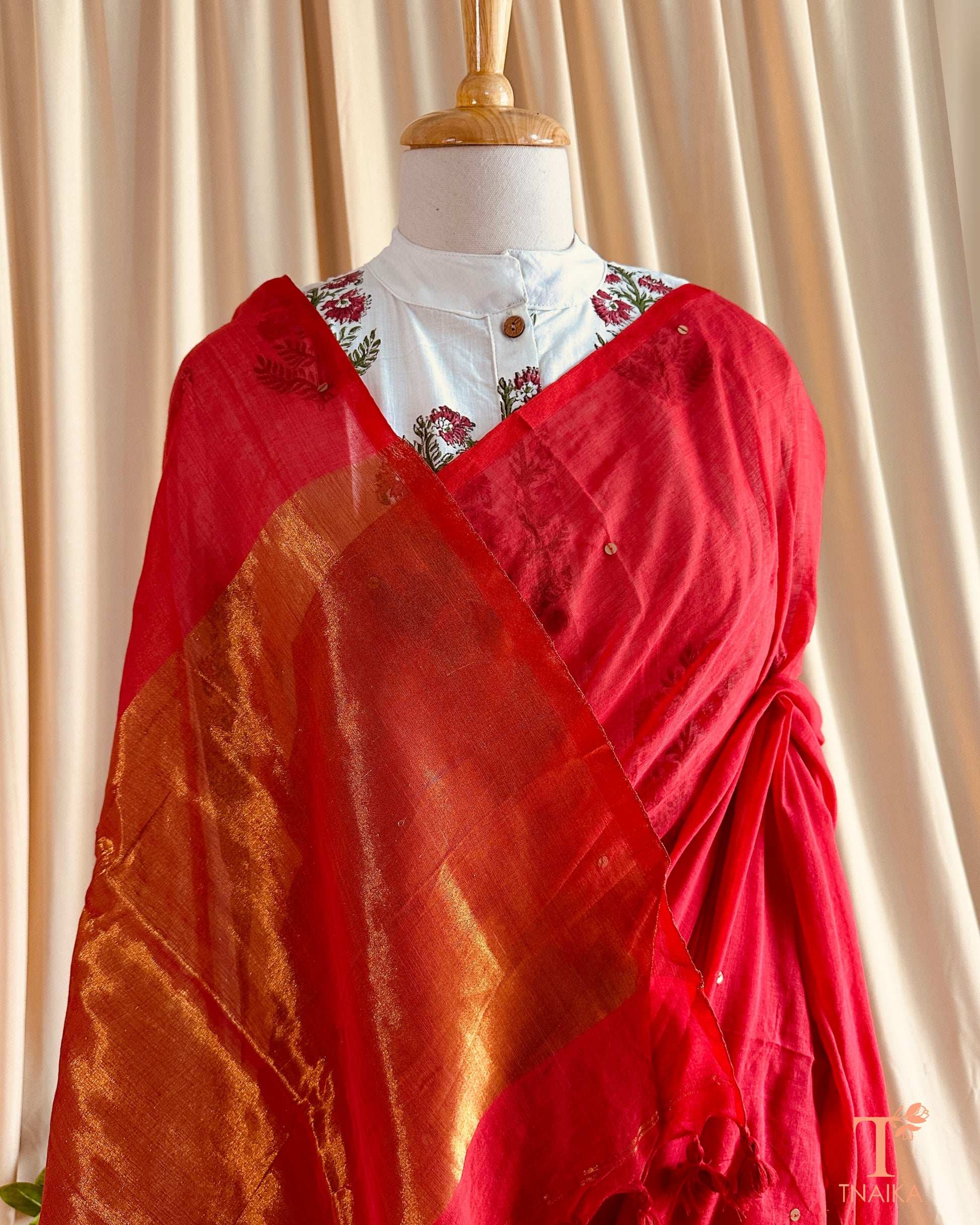 Lightweight breathable cotton saree with earthy tones, blending simplicity and elegance