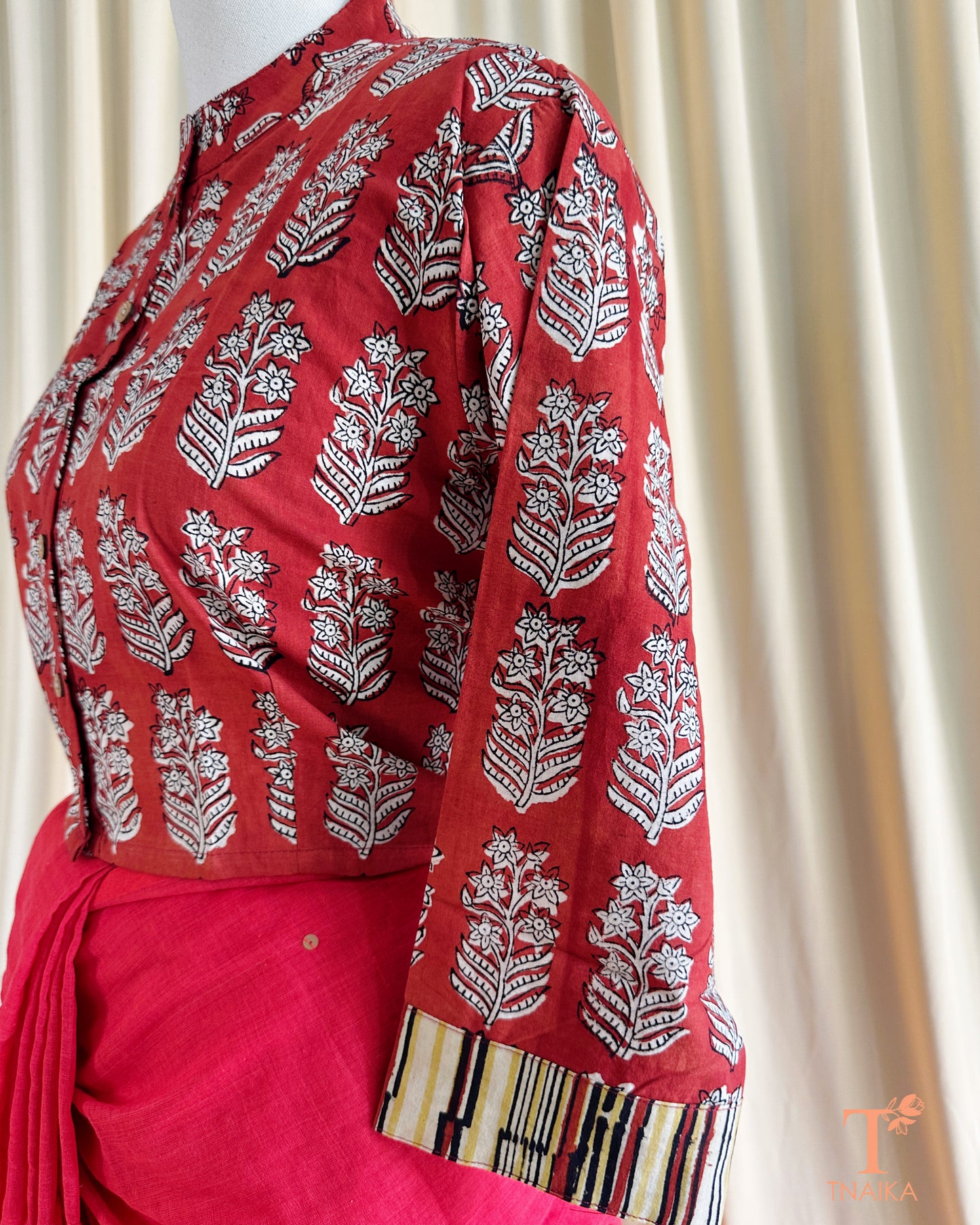 Handcrafted cotton blouse with block prints, ideal for festive and casual styling