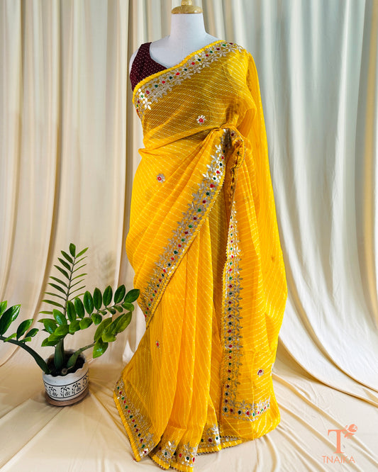 Kota Doria saree with vibrant Leheriya print and intricate Gotta Patti handwork