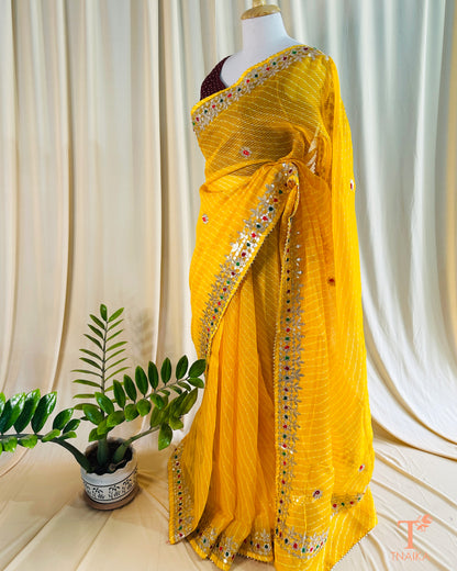 Elegant Leheriya Kota Doria saree paired with a contrast blouse for festive occasions