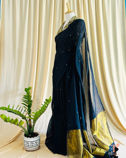 Cotton saree with golden tissue weave pallu and unstitched running blouse.