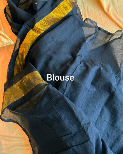 Cotton saree with golden tissue weave pallu and unstitched running blouse.