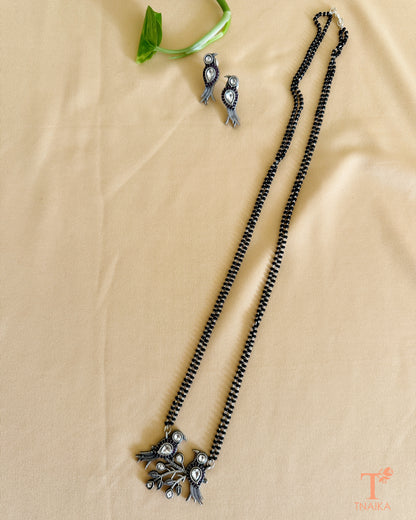 Traditional oxidised mangalsutra with bird design and black beaded chain