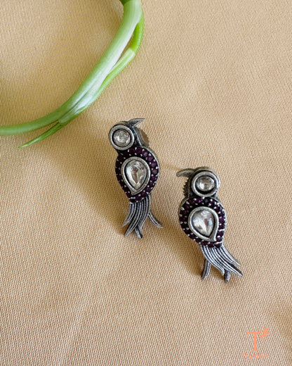 Close-up of oxidised bird pendant mangalsutra adorned with shimmering stones