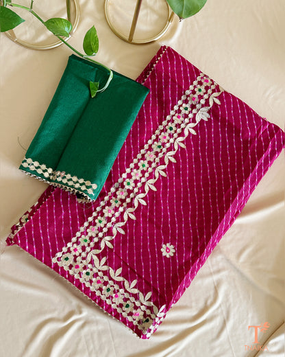 Lightweight Kota Doria saree in vibrant wine with exquisite handcrafted Gotta Patti embellishments.