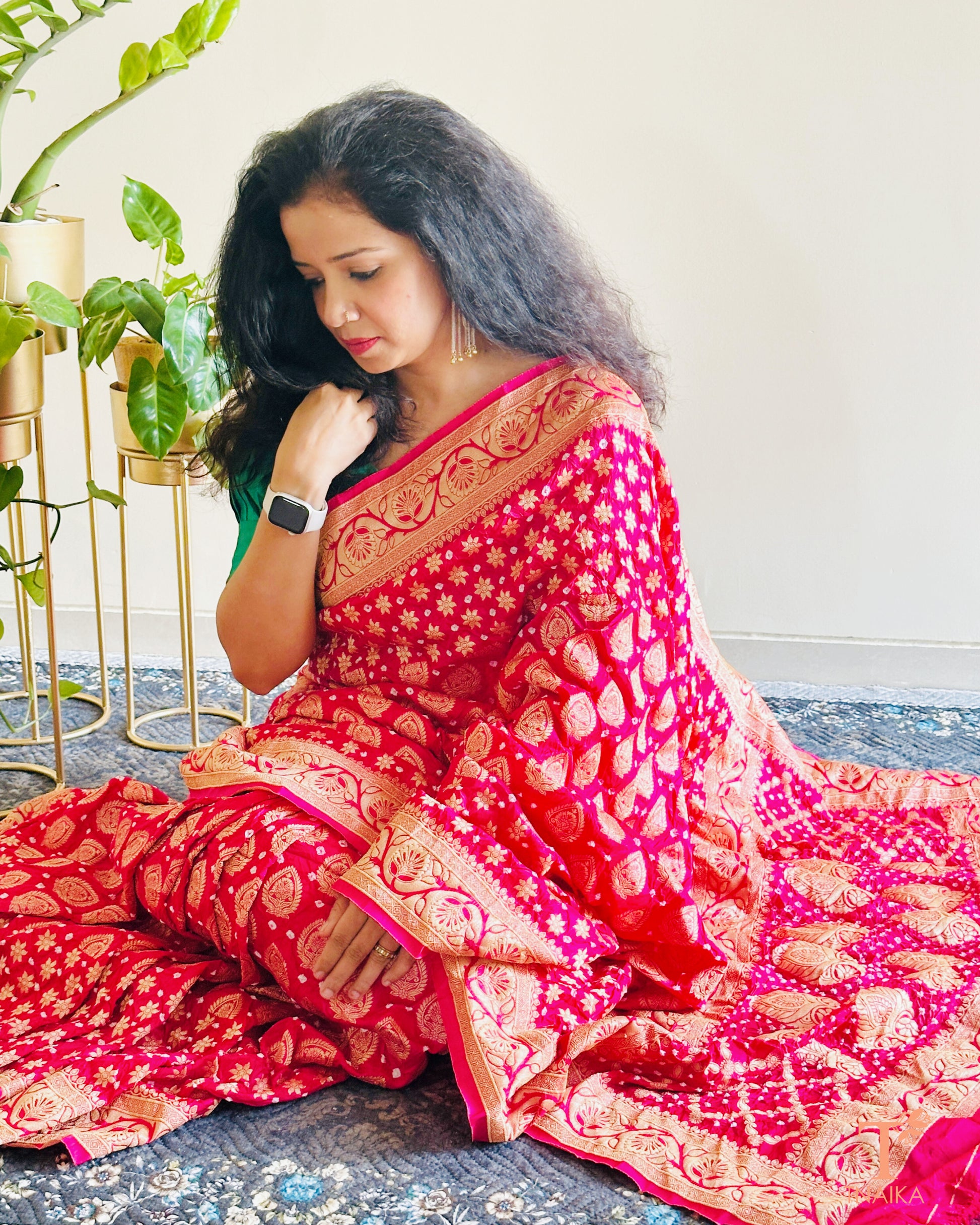 Festive Upada silk saree with Bandhej print and woven zari border.