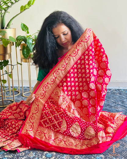 Festive Upada silk saree with Bandhej print and woven zari border.