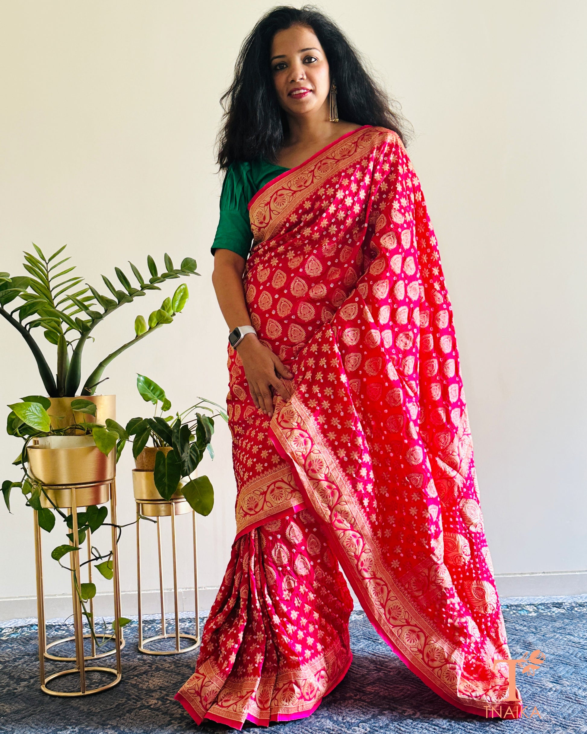 Festive Upada silk saree with Bandhej print and woven zari border.