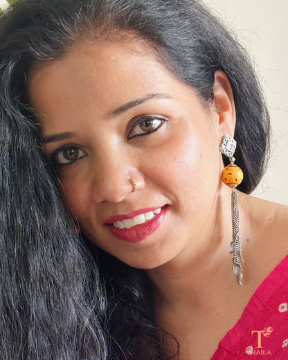 Oxidised Meena work earrings with chain hangings in silver replica finish