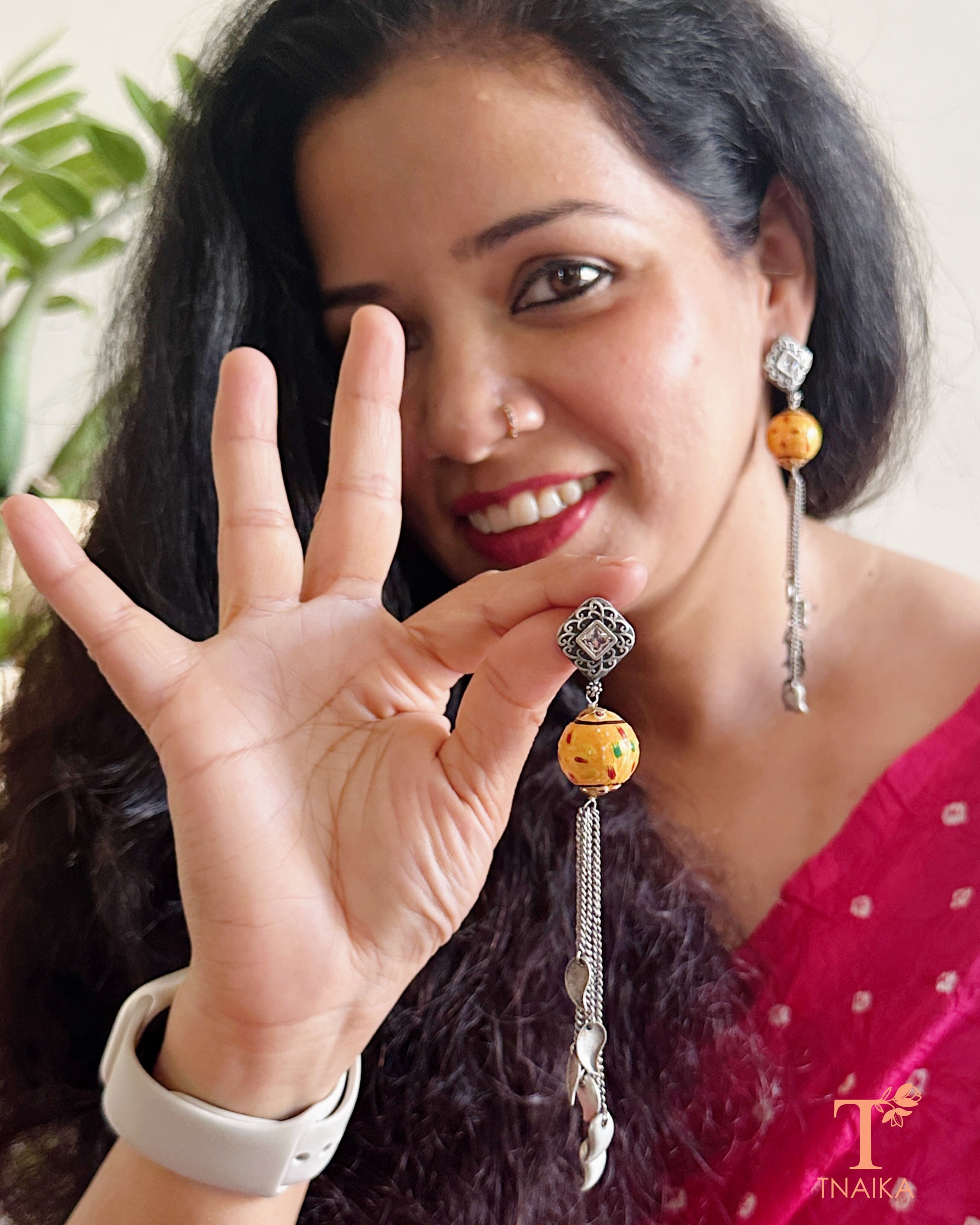 Antique oxidised earrings featuring Meenakari detailing and chain drops